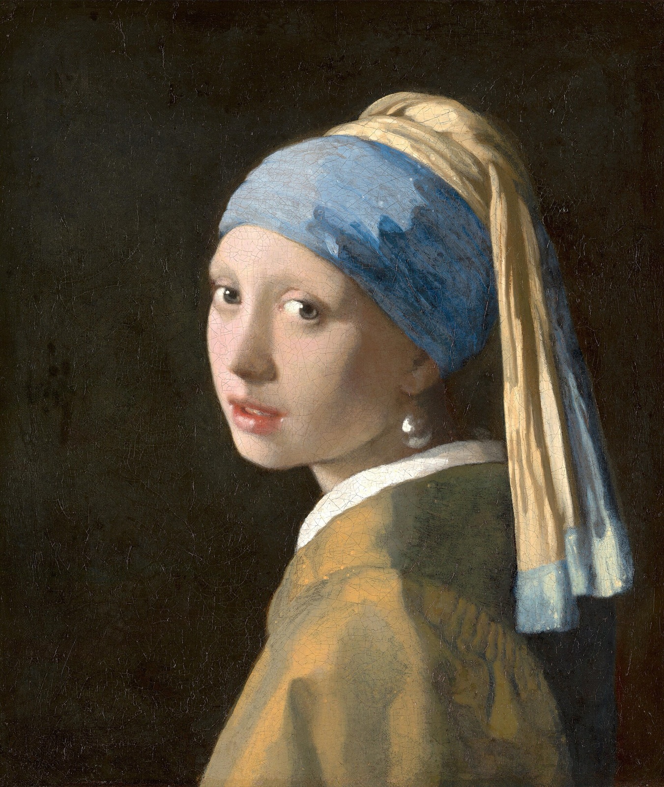 维米尔《戴珍珠耳环的少女》，少女回头望向观众